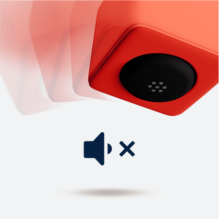 Catchbox Cube throwable microphone in mid-air with a crossed-out sound icon, illustrating its automatic muting feature when thrown, caught, or dropped to prevent any unpleasant sounds.