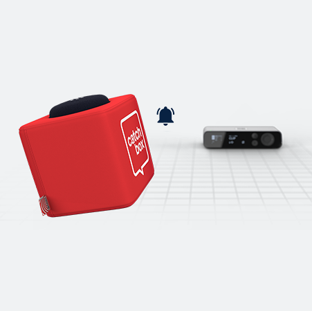 An illustration showing the Catchbox Cube throwable microphone, a bell icon, and the Catchbox DSP Hub in the background, symbolizing an out-of-range alarm notification.