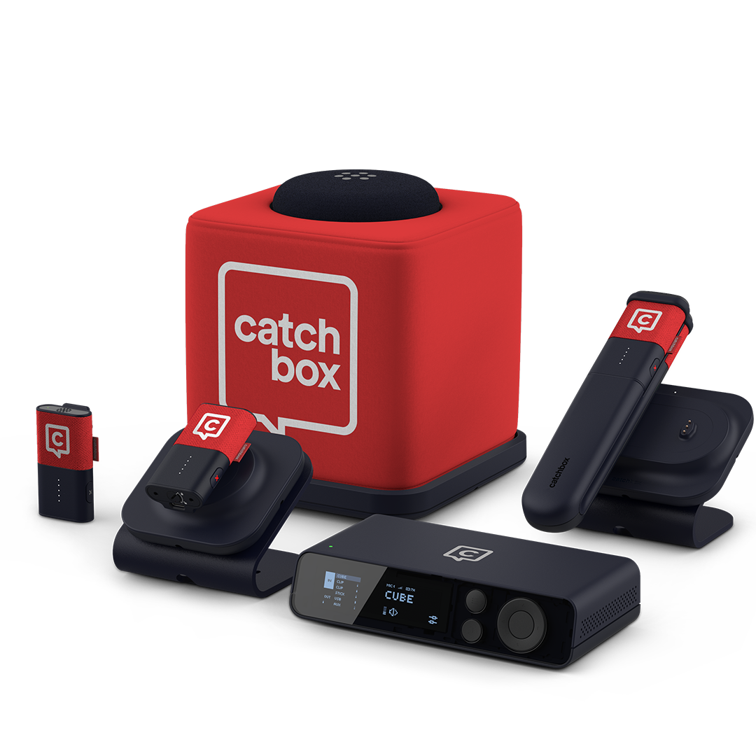 Catchbox Plus system with Hub DSP receiver, Stick handheld, Clip wearable mics placed on Charging Dock, Cube throwable mic on Charging Base.